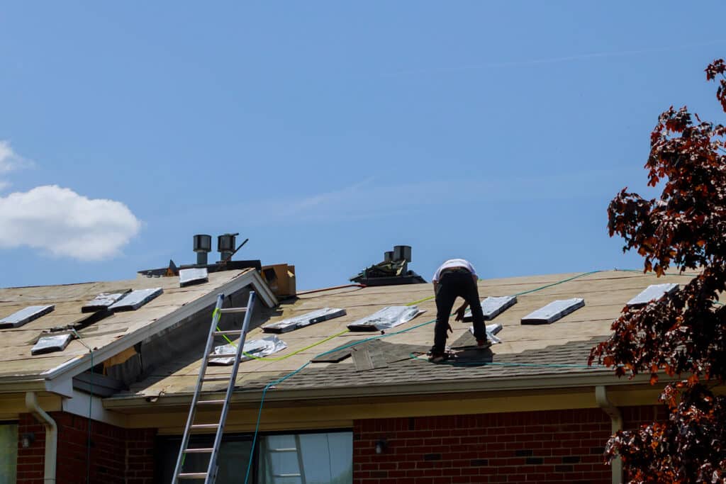 replacing shingles on house